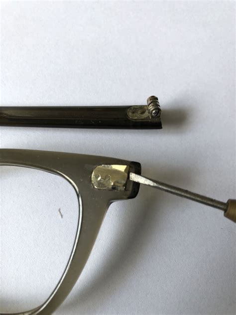 how to fix eyeglass hinge.